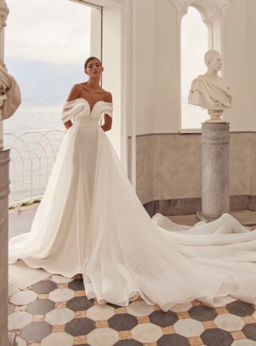 olya mak charmy draped off shoulder mermaid long train crepe wedding dress 01