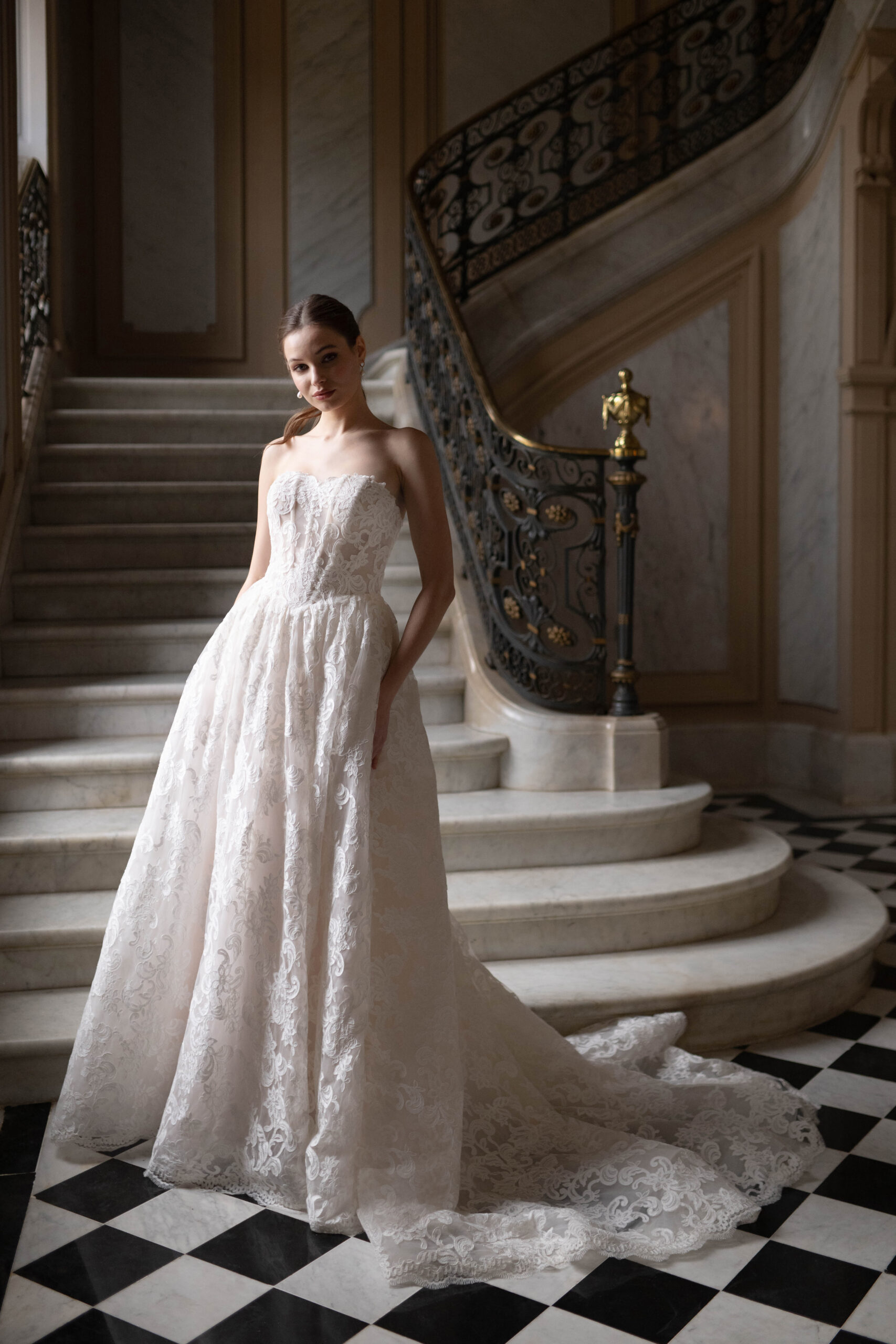 Fabric is Lace & Tulle, silhouette is Ball Gown, neckline is Sweetheart, sleeve style is Strapless, train is Chapel, waistline is Basque, embellishment is Floral Lace Appliqué, back is Corset Back, color is Champagne/Ivory/Nude, style is Romantic Couture, Sheer bodice, pockets