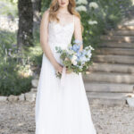 Fabric is Chiffon & Lace, silhouette is A-line, neckline is Sweetheart, sleeve style is Spaghetti Straps, train is Chapel, waistline is Natural, embellishment is Beaded Lace Appliqué, back is Low Scoop with Buttons, color is Ivory/Champagne/Nude, style is Romantic Garden, Lightweight, ethereal flow