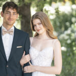 Fabric is Chiffon & Lace, silhouette is A-line, neckline is Sweetheart, sleeve style is Spaghetti Straps, train is Chapel, waistline is Natural, embellishment is Beaded Lace Appliqué, back is Low Scoop with Buttons, color is Ivory/Champagne/Nude, style is Romantic Garden, Lightweight, ethereal flow