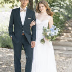 Fabric is Chiffon & Lace, silhouette is A-line, neckline is Sweetheart, sleeve style is Spaghetti Straps, train is Chapel, waistline is Natural, embellishment is Beaded Lace Appliqué, back is Low Scoop with Buttons, color is Ivory/Champagne/Nude, style is Romantic Garden, Lightweight, ethereal flow