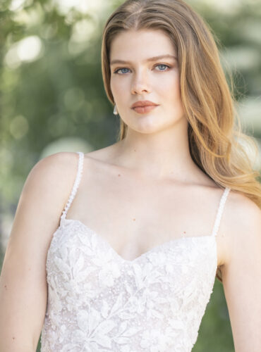 Fabric is Chiffon & Lace, silhouette is A-line, neckline is Sweetheart, sleeve style is Spaghetti Straps, train is Chapel, waistline is Natural, embellishment is Beaded Lace Appliqué, back is Low Scoop with Buttons, color is Ivory/Champagne/Nude, style is Romantic Garden, Lightweight, ethereal flow