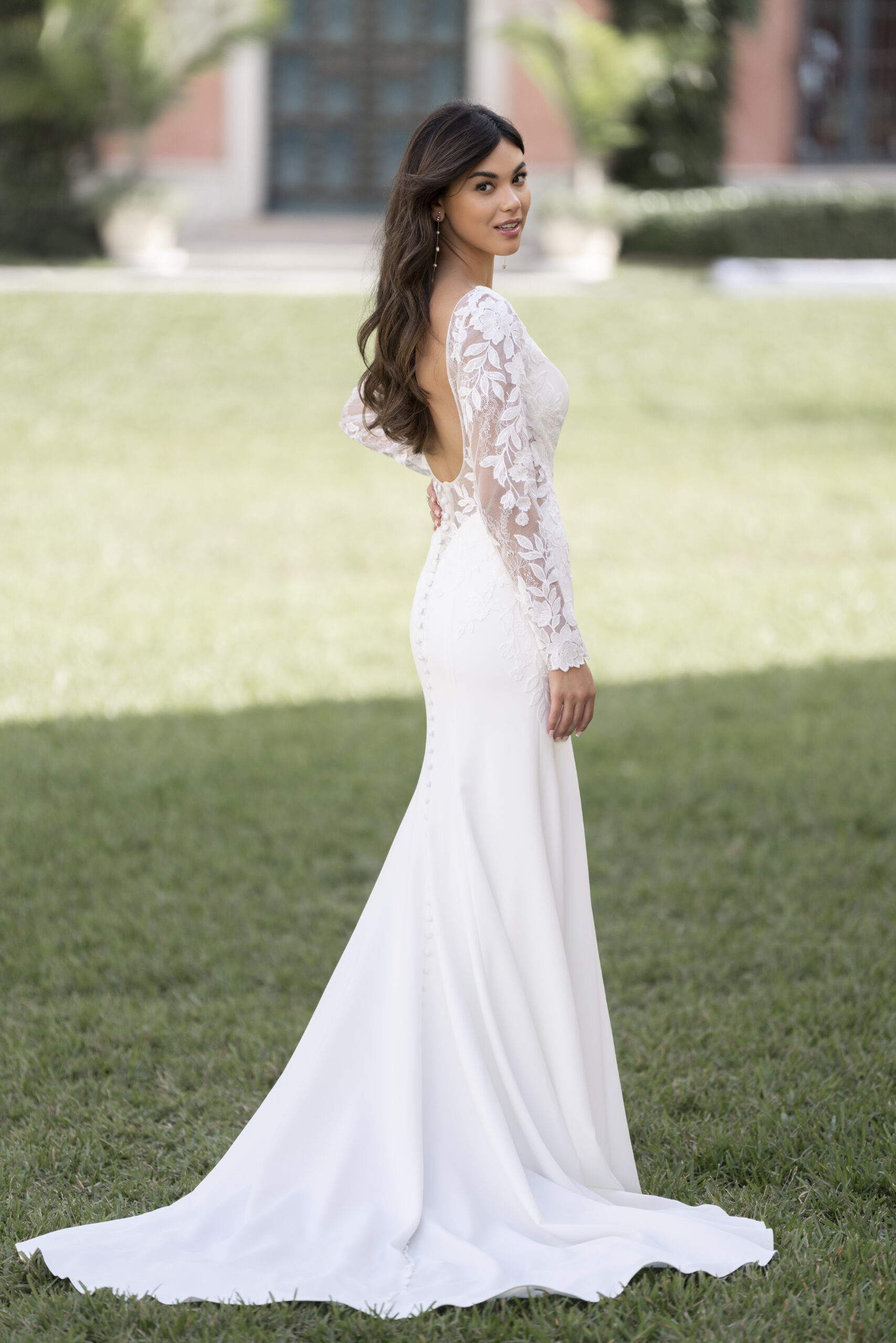 R3851 03 Fabric is Crepe & Lace, silhouette is Sheath, neckline is High Neckline, sleeve style is Long Lace, train is Sweep Train, waistline is Natural, embellishment is Lace Appliqué, back is Low Scoop, color is Ivory/Nude, style is Minimalist Elegance, Buttons down the back