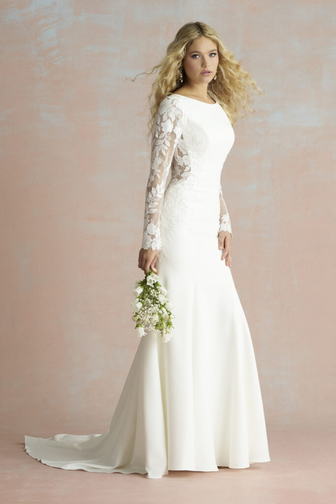 Fabric is Crepe & Lace, silhouette is Sheath, neckline is High Neckline, sleeve style is Long Lace, train is Sweep Train, waistline is Natural, embellishment is Lace Appliqué, back is Low Scoop, color is Ivory/Nude, style is Minimalist Elegance, Buttons down the back