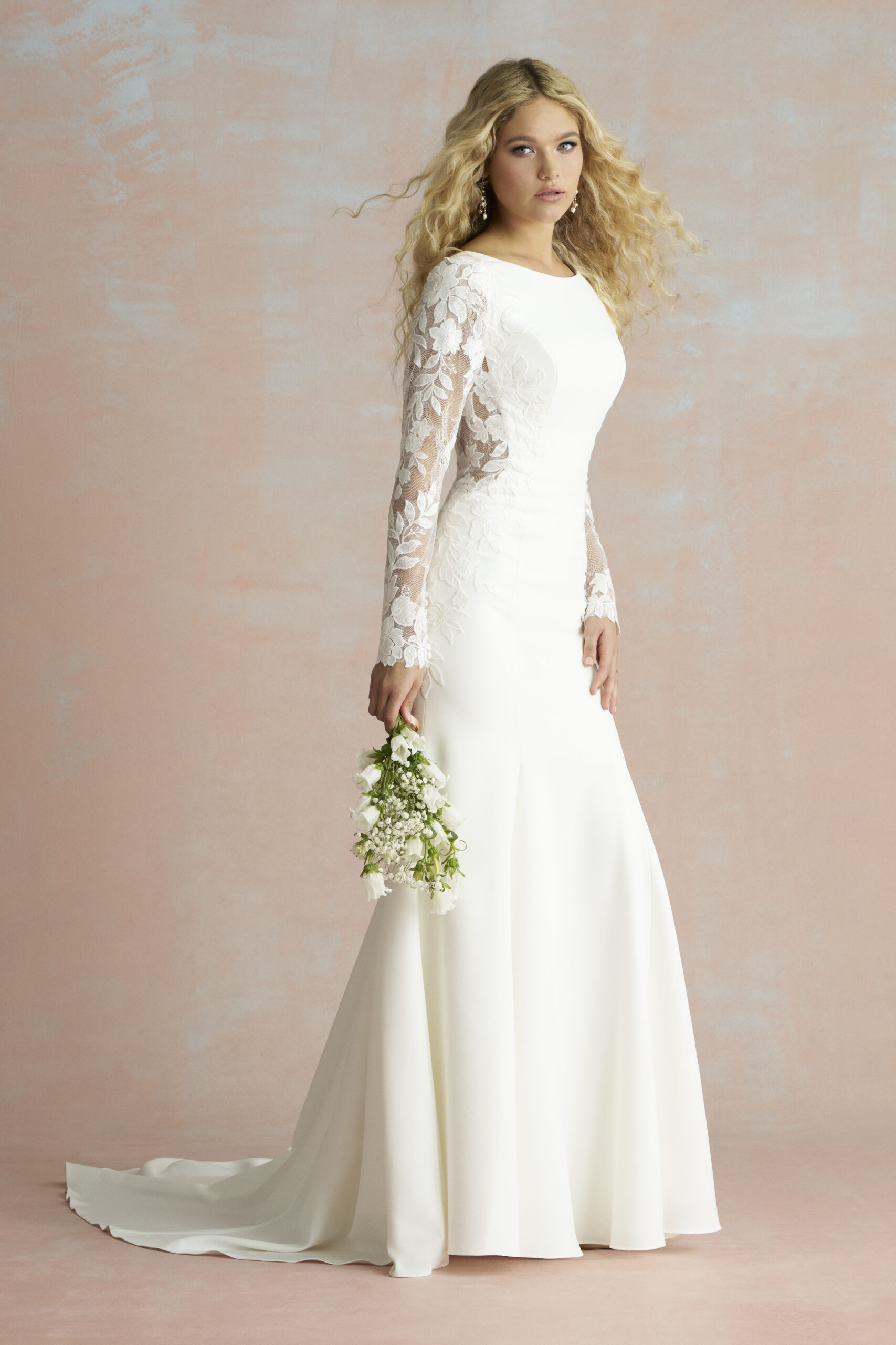 Fabric is Crepe & Lace, silhouette is Sheath, neckline is High Neckline, sleeve style is Long Lace, train is Sweep Train, waistline is Natural, embellishment is Lace Appliqué, back is Low Scoop, color is Ivory/Nude, style is Minimalist Elegance, Buttons down the back