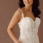Fabric is Lace & Tulle, silhouette is Fit and Flare, neckline is Sweetheart, sleeve style is Convertible straps, train is Chapel, waistline is Natural, embellishment is 3D Floral Lace, Beading, back is Illusion Sheer Back, color is Ivory/Nude, style is Romantic, Modern Lace, Convertible floral straps (on-shoulder or off-the-shoulder); sculpted corset bodice