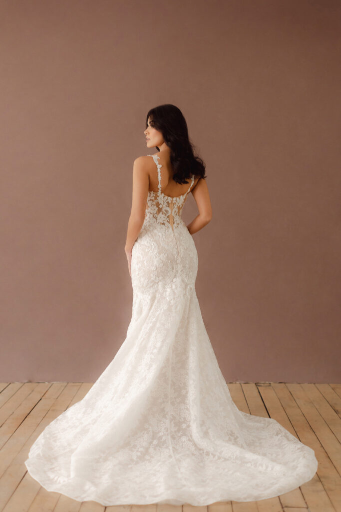 Fabric is Lace & Tulle, silhouette is Fit and Flare, neckline is Sweetheart, sleeve style is Convertible straps, train is Chapel, waistline is Natural, embellishment is 3D Floral Lace, Beading, back is Illusion Sheer Back, color is Ivory/Nude, style is Romantic, Modern Lace, Convertible floral straps (on-shoulder or off-the-shoulder); sculpted corset bodice