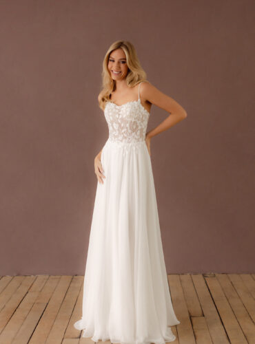 Fabric is Chiffon & Lace, silhouette is A-line, neckline is Scoop, sleeve style is Spaghetti Straps, train is Chapel, waistline is Natural, embellishment is Floral Lace Appliqué, back is Low Back, color is Ivory, style is Romantic Boho, Sheer bodice, Light sparkle