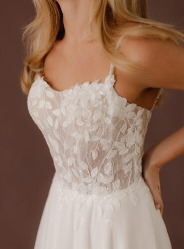 Fabric is Chiffon & Lace, silhouette is A-line, neckline is Scoop, sleeve style is Spaghetti Straps, train is Chapel, waistline is Natural, embellishment is Floral Lace Appliqué, back is Low Back, color is Ivory, style is Romantic Boho, Sheer bodice, Light sparkle