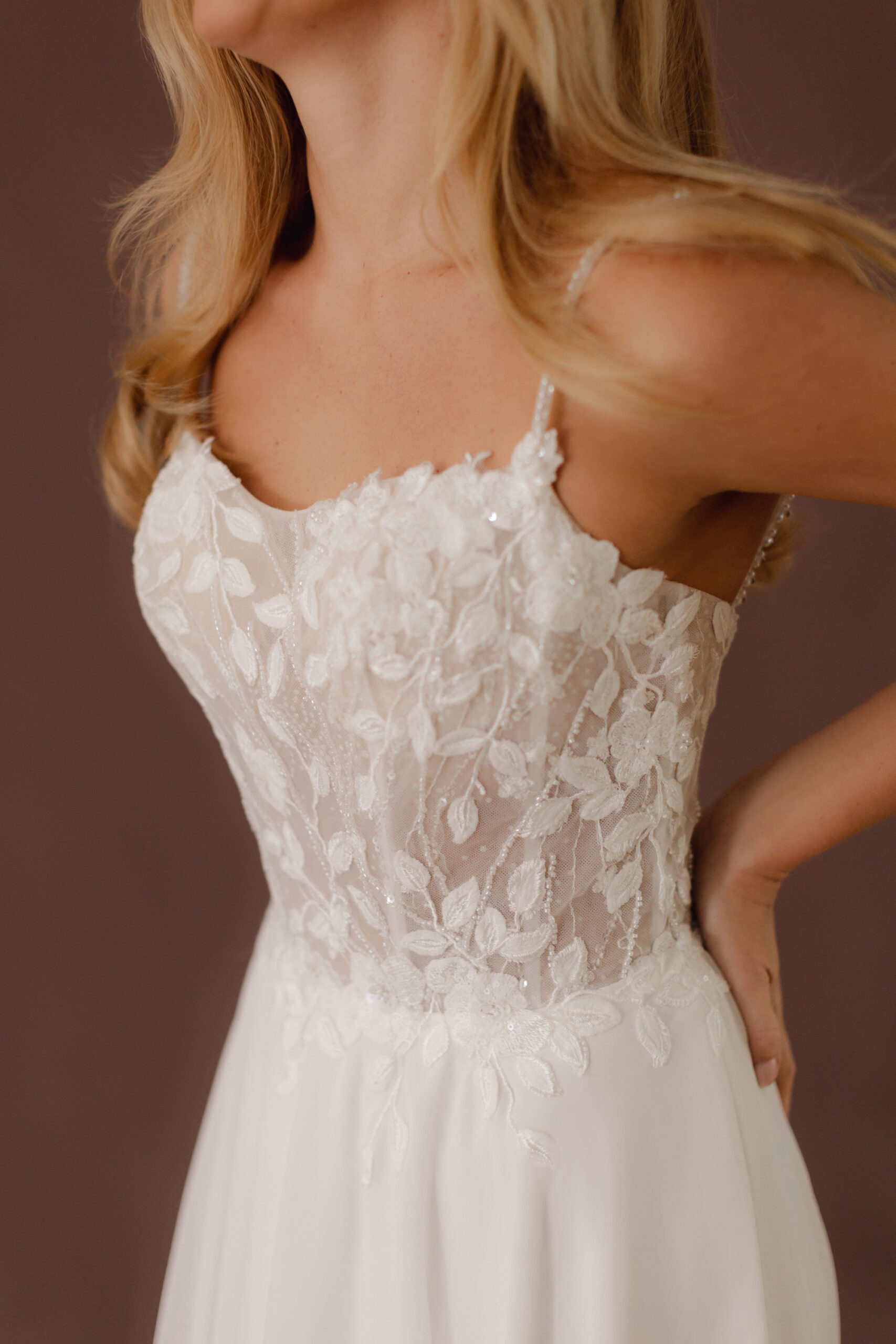 X155 Studio 02 Fabric is Chiffon & Lace, silhouette is A-line, neckline is Scoop, sleeve style is Spaghetti Straps, train is Chapel, waistline is Natural, embellishment is Floral Lace Appliqué, back is Low Back, color is Ivory, style is Romantic Boho, Sheer bodice, Light sparkle