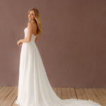 Fabric is Chiffon & Lace, silhouette is A-line, neckline is Scoop, sleeve style is Spaghetti Straps, train is Chapel, waistline is Natural, embellishment is Floral Lace Appliqué, back is Low Back, color is Ivory, style is Romantic Boho, Sheer bodice, Light sparkle