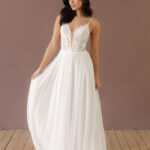 Fabric is Chiffon & Lace, silhouette is A-line, neckline is Plunging V, sleeve style is Spaghetti Straps, train is Sweep Train, waistline is Natural Waist, embellishment is Floral Appliqué, Sequins, back is Deep V, Sheer Illusion, color is Soft White / Ivory, style is Romantic Boho, Light, flowy, comfortable