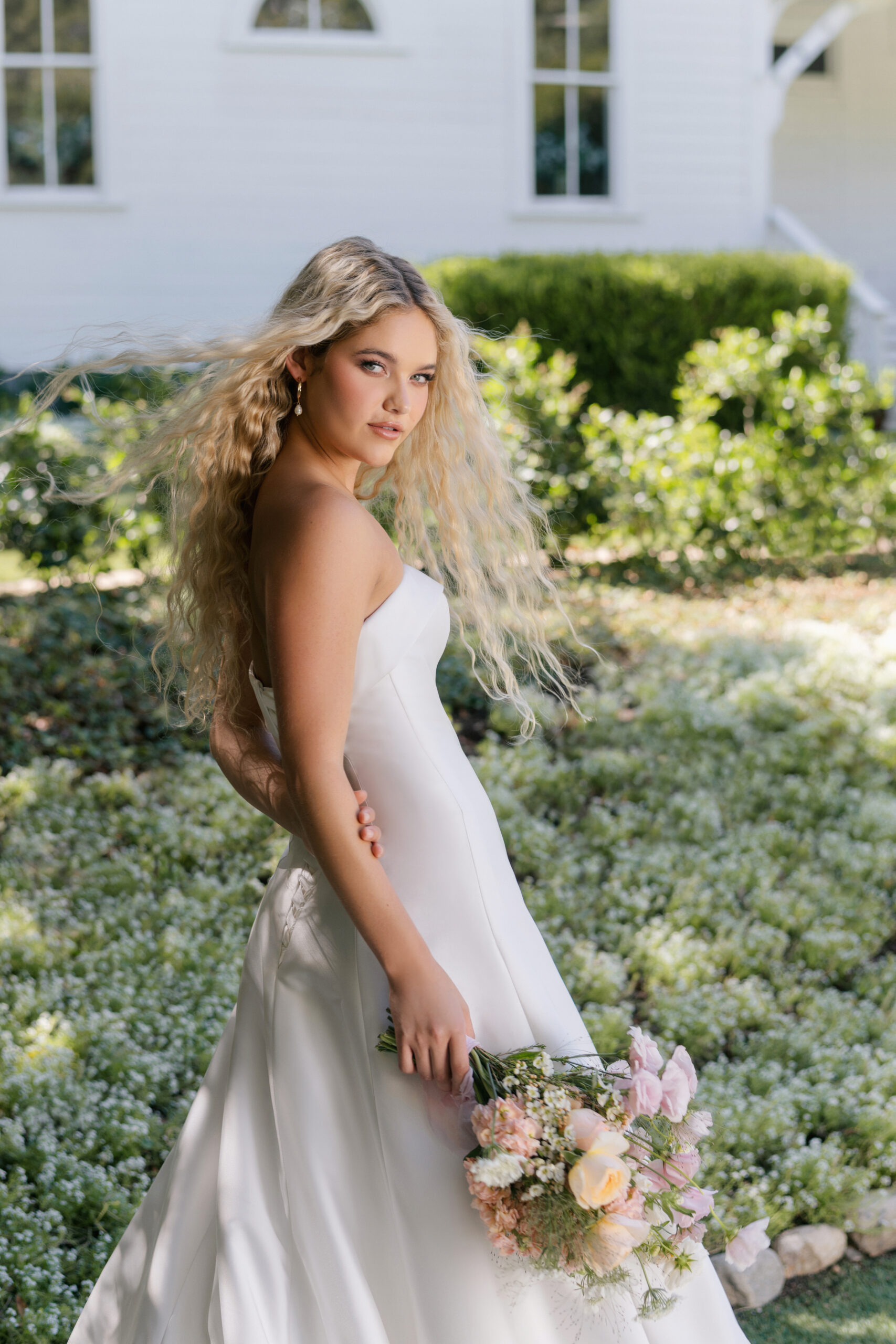 R3905 08 Fabric is Mikado, silhouette is A-line, neckline is Rolled strapless, sleeve style is Strapless, train is Chapel, waistline is Natural, embellishment is Minimalist, structured, back is Lace-up corset, color is Ivory, style is Modern classic, Clean lines, elegant tailoring