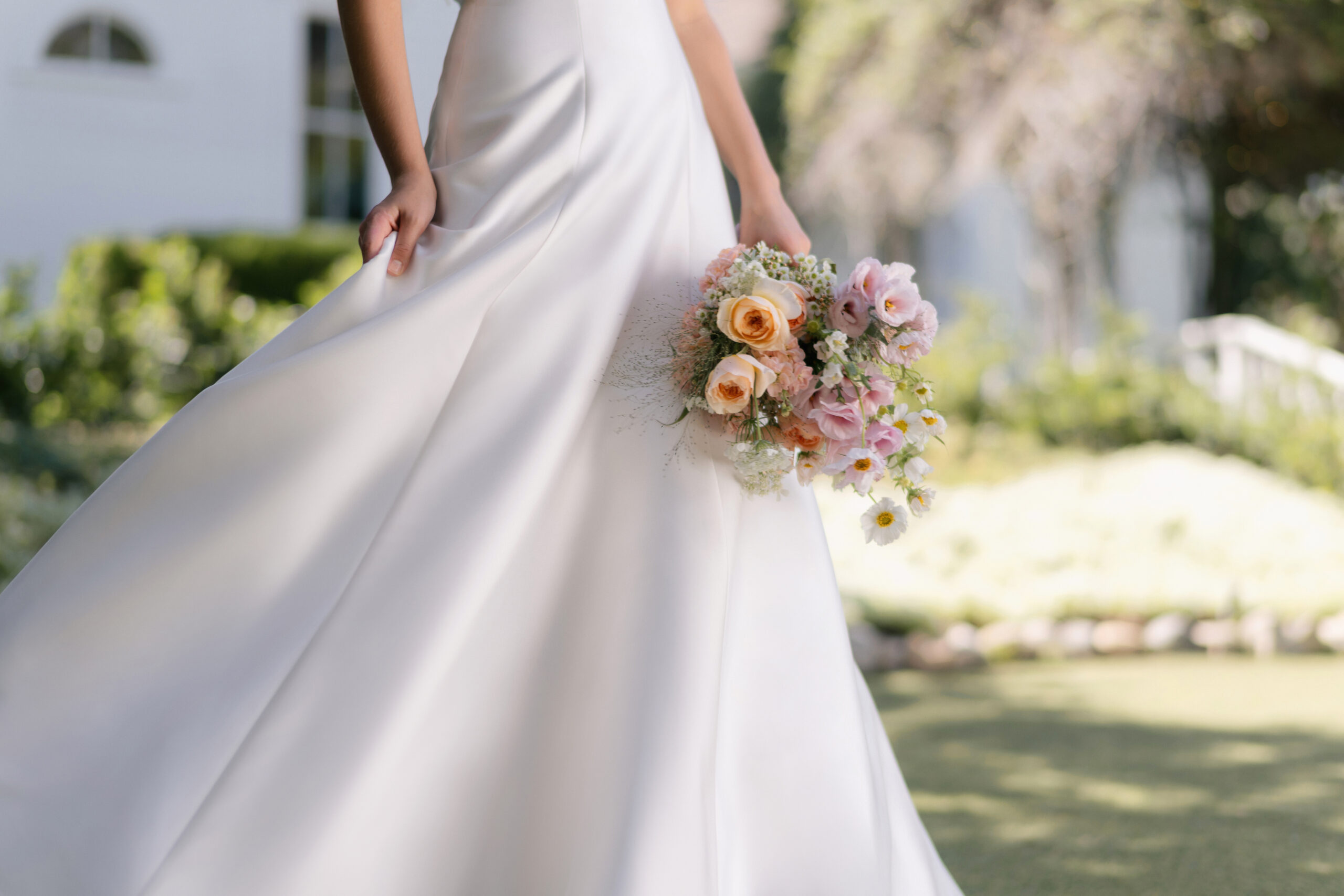 R3905 09 Fabric is Mikado, silhouette is A-line, neckline is Rolled strapless, sleeve style is Strapless, train is Chapel, waistline is Natural, embellishment is Minimalist, structured, back is Lace-up corset, color is Ivory, style is Modern classic, Clean lines, elegant tailoring