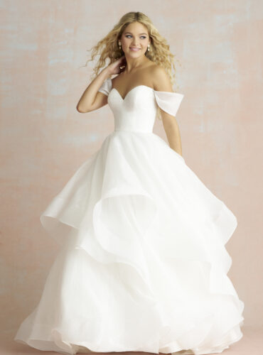 Fabric is Crushed organza, silhouette is Ballgown, neckline is Sweetheart, sleeve style is Off-shoulder, train is Chapel, waistline is Natural, embellishment is Layered skirt, back is V-back, color is Ivory, style is Romantic classic, Handkerchief hem